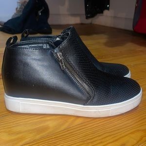 Black zippy shoes